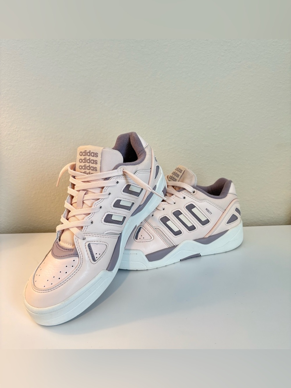 Adidas Midcity Low sneakers in a light pink and grey